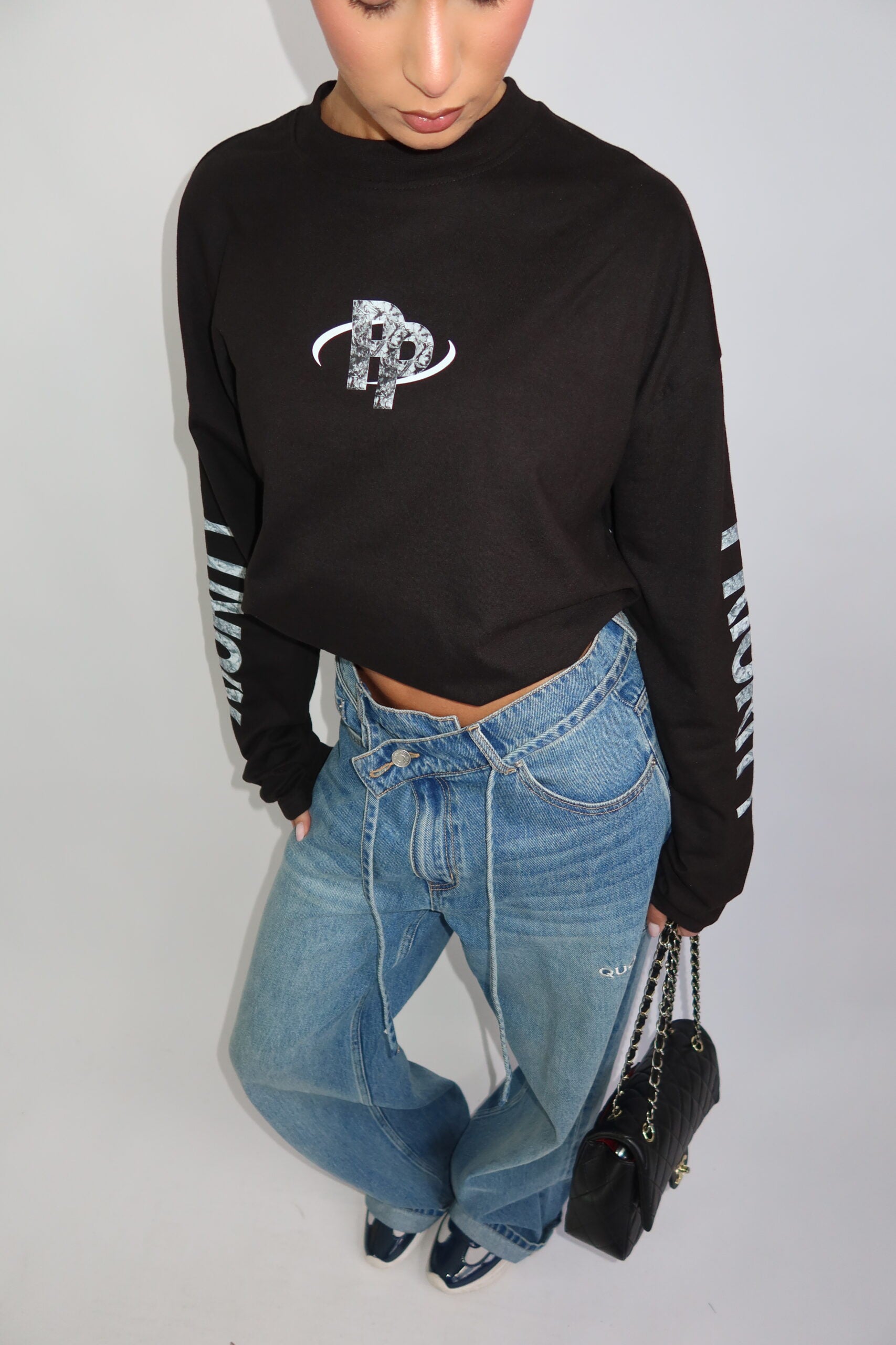 Priority return longsleeve zwart