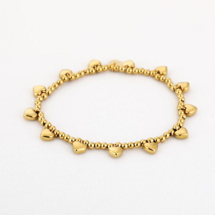 Elastiek kralen hartjes armband goud