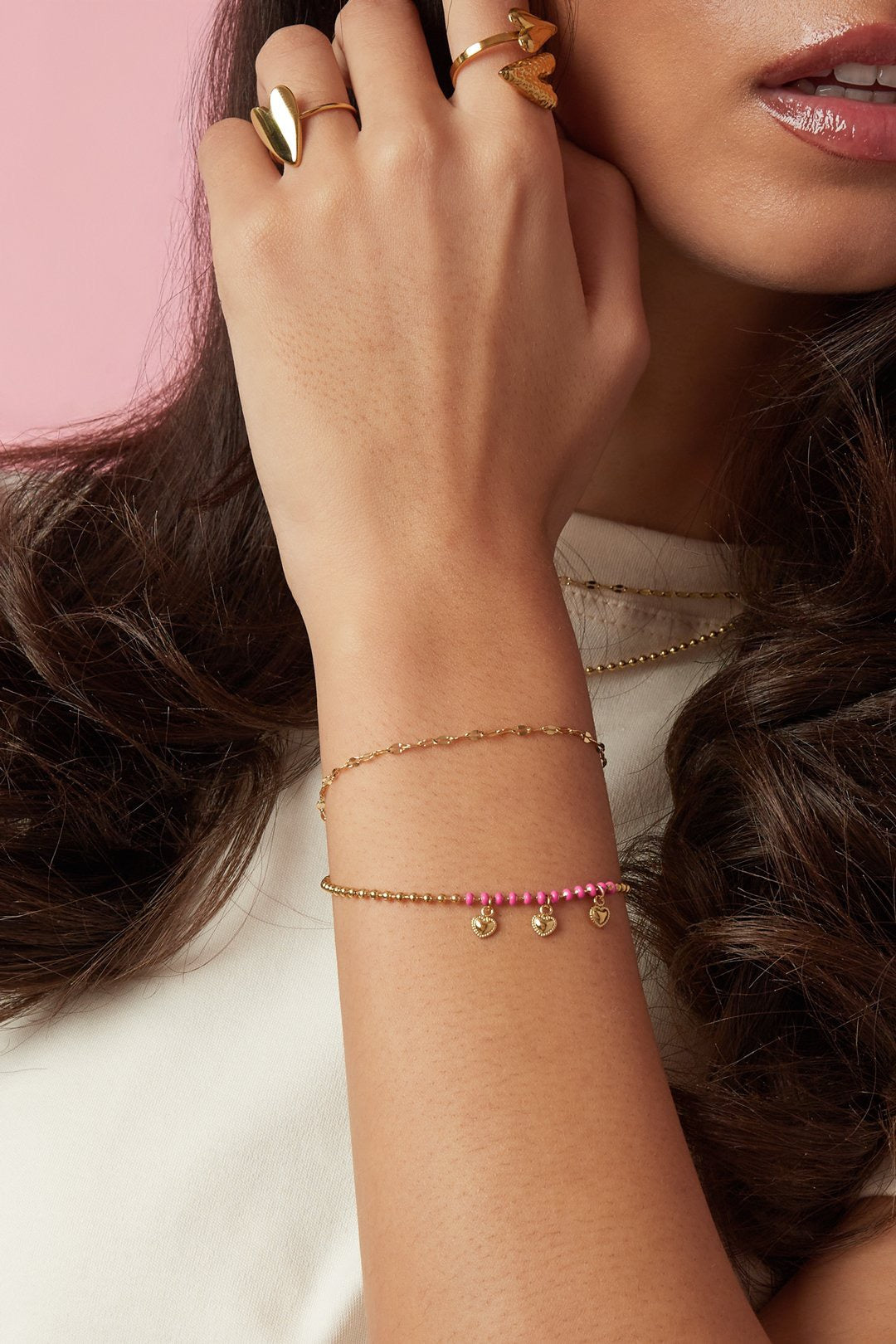 Double heart armband goud roze