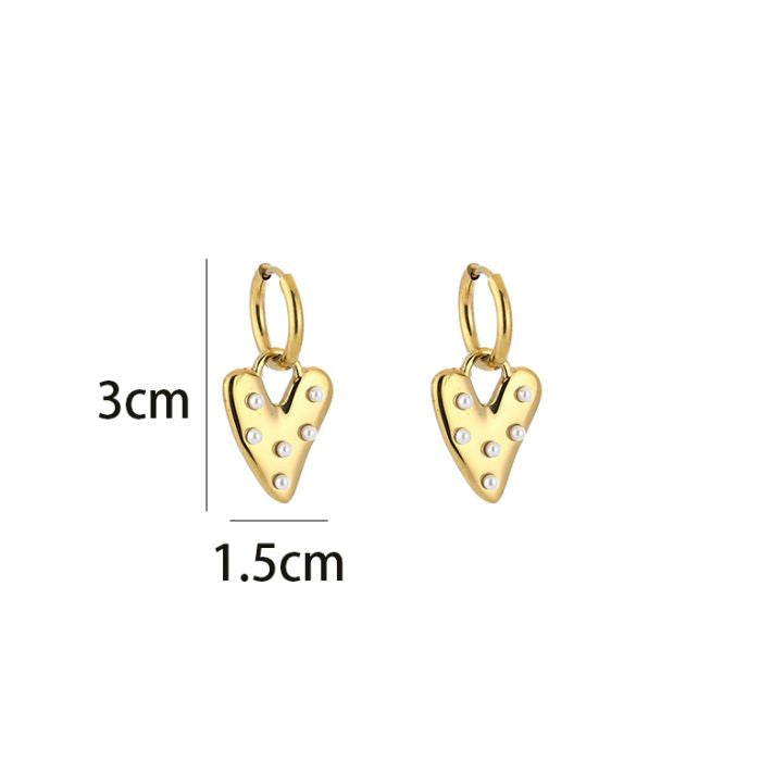 Pearl heart oorbellen goud