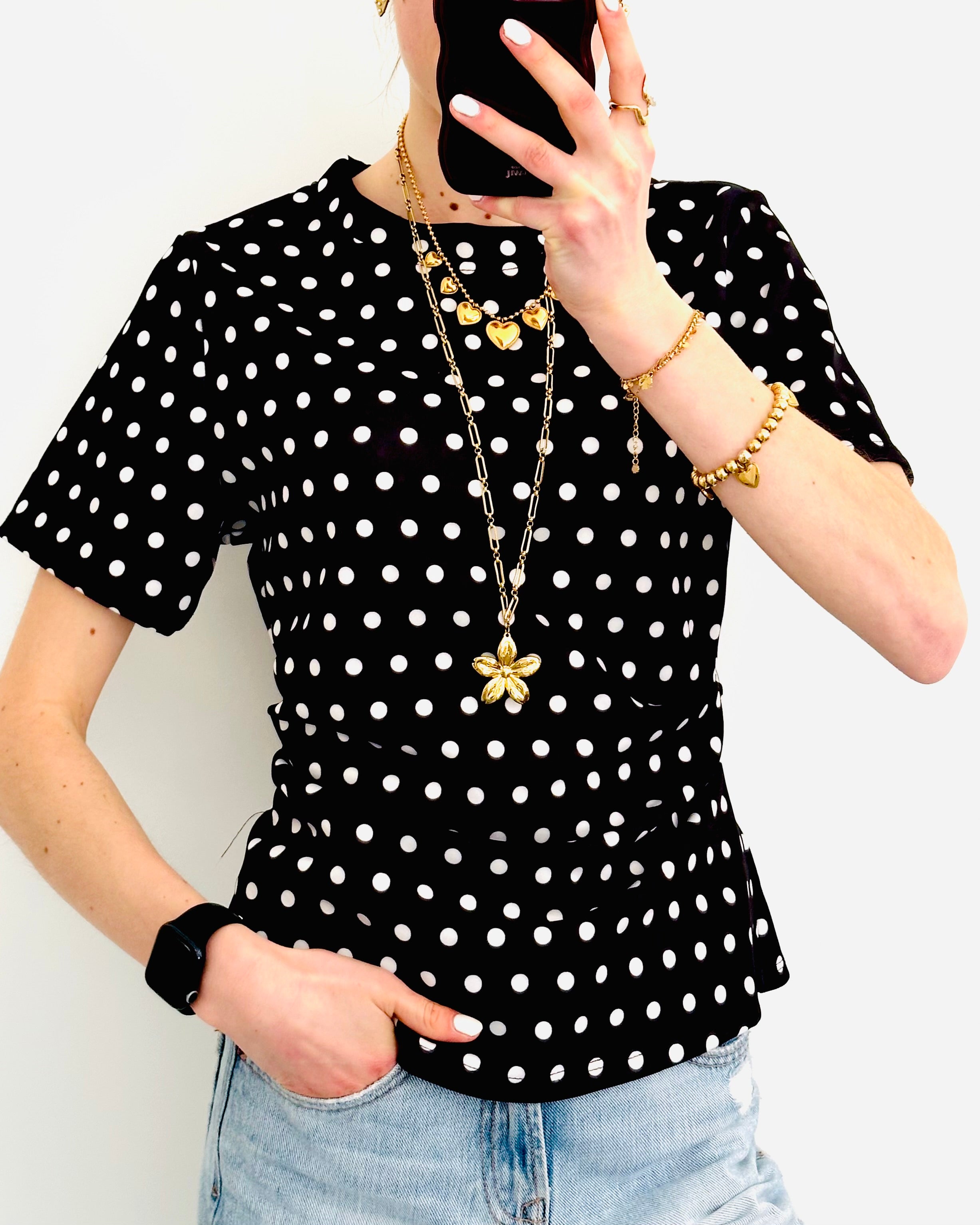 Polka dots top getailleerd zwart wit