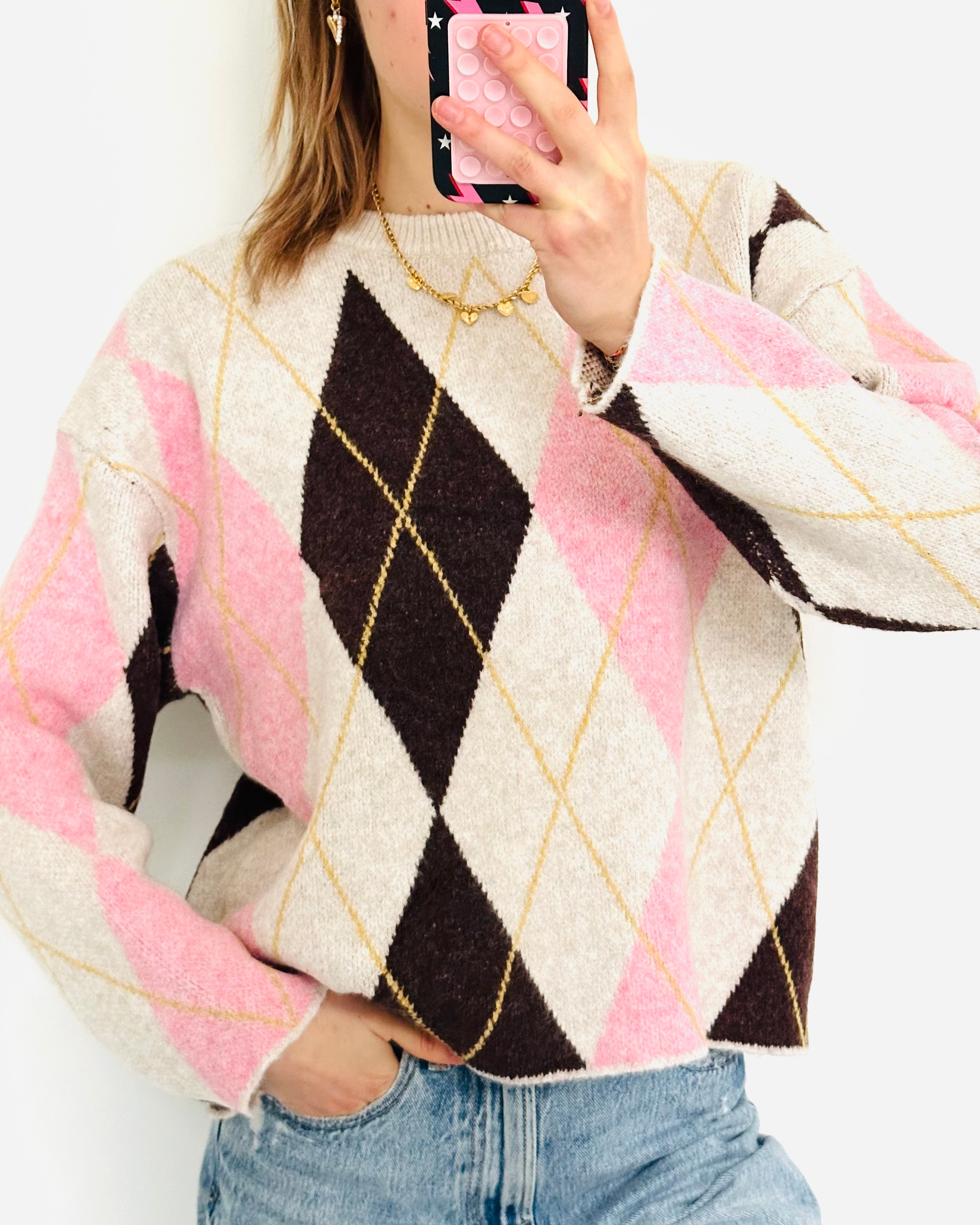 Geruite sweater roze