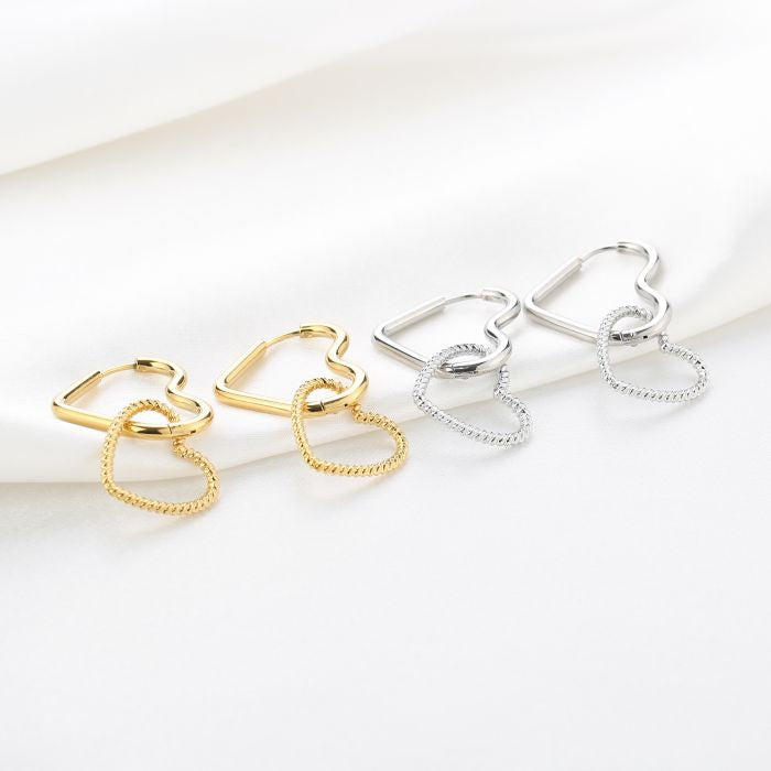 Double heart oorbellen goud