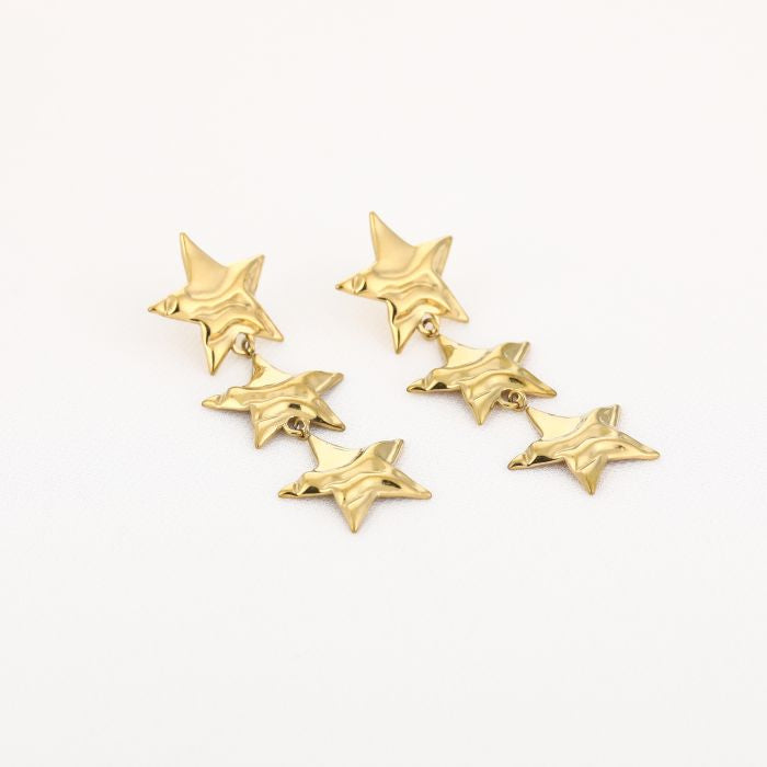 Triple star oorbellen goud