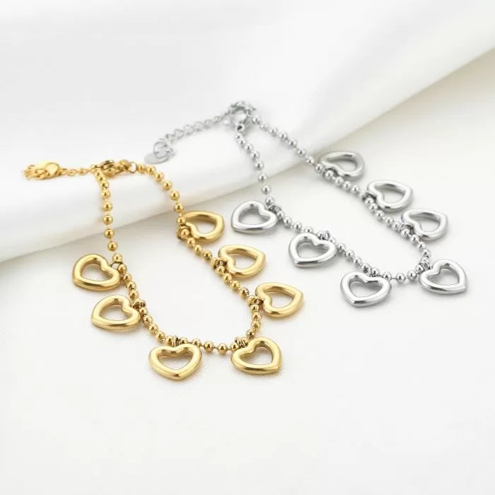 Heart charms armband goud